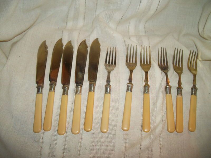 Vintage silver flatware w/bakelite? plastic handles  