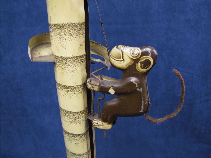 Vintage Tin Monkey Climbing Palm Tree Emporium Spec Co  