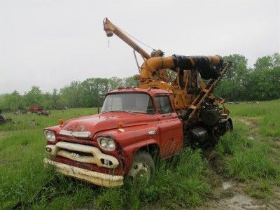   TRUCK WITH MINNEAPOLIS MOLINE 1200 CORN SHELLER.   